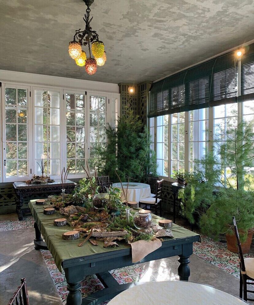Dining room overlooking the expansive gardens. Blithewold must be enjoyed for its amazing gardens in warm months and its beautiful decor in cold.
