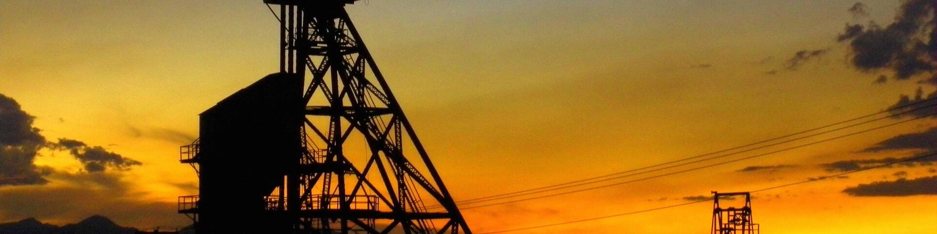 Butte which includes a sunset