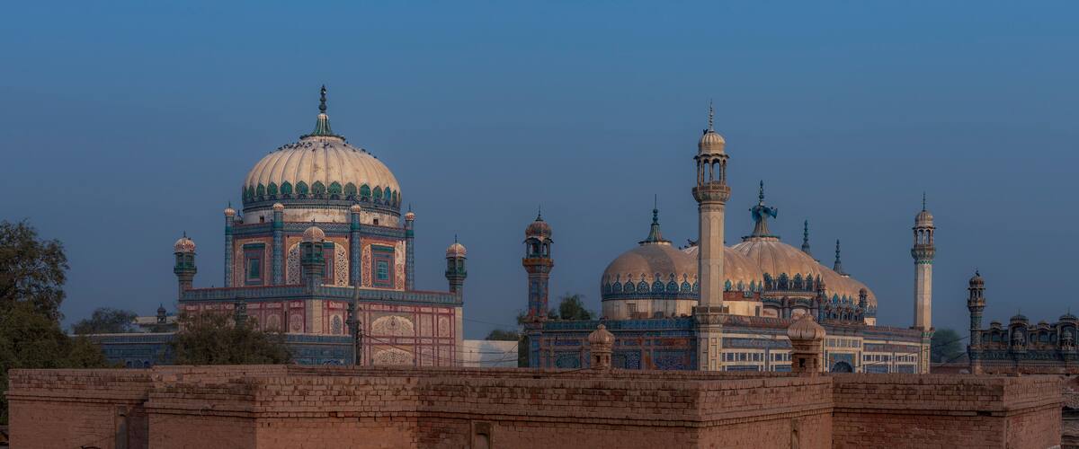 A mosque with domes and minarets.