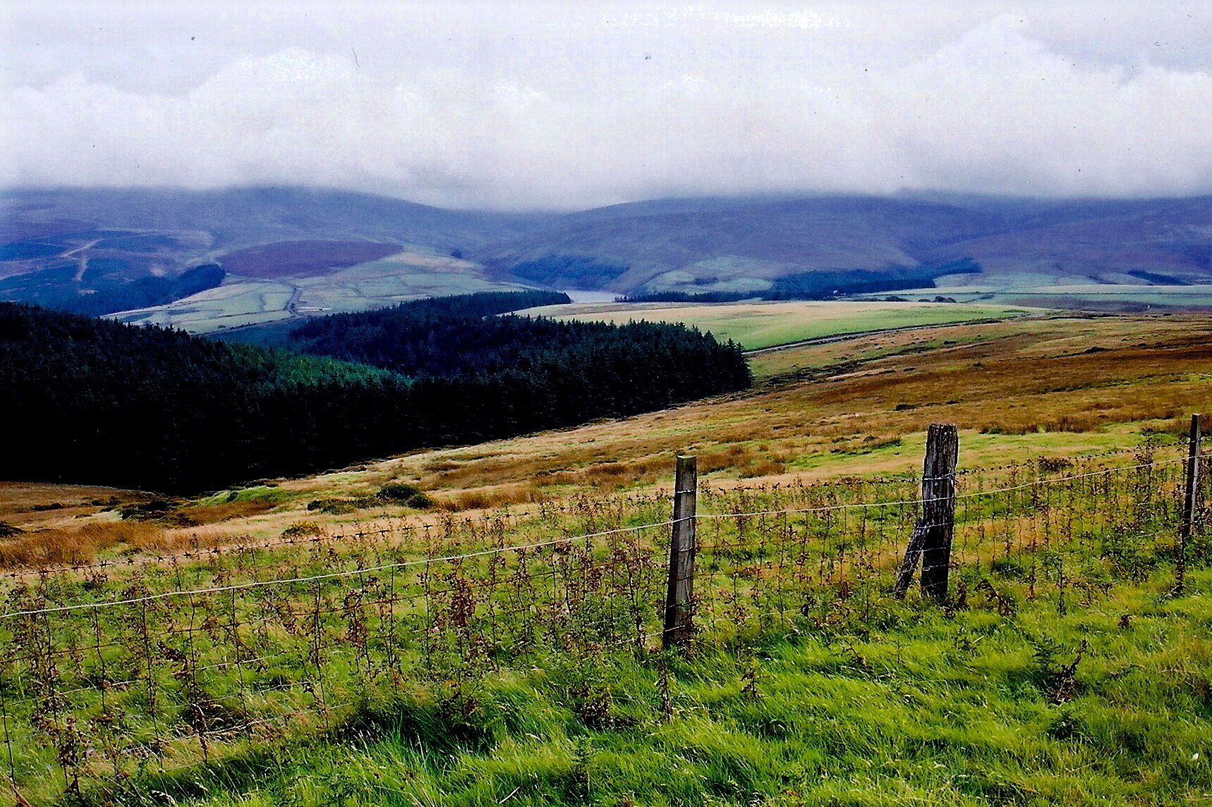 Druidale Road - Southwest of Sulby Reservoir - Hills View is to the southeast. Shown in the distance at the middle of the image is a portion of Sulby Reservoir.