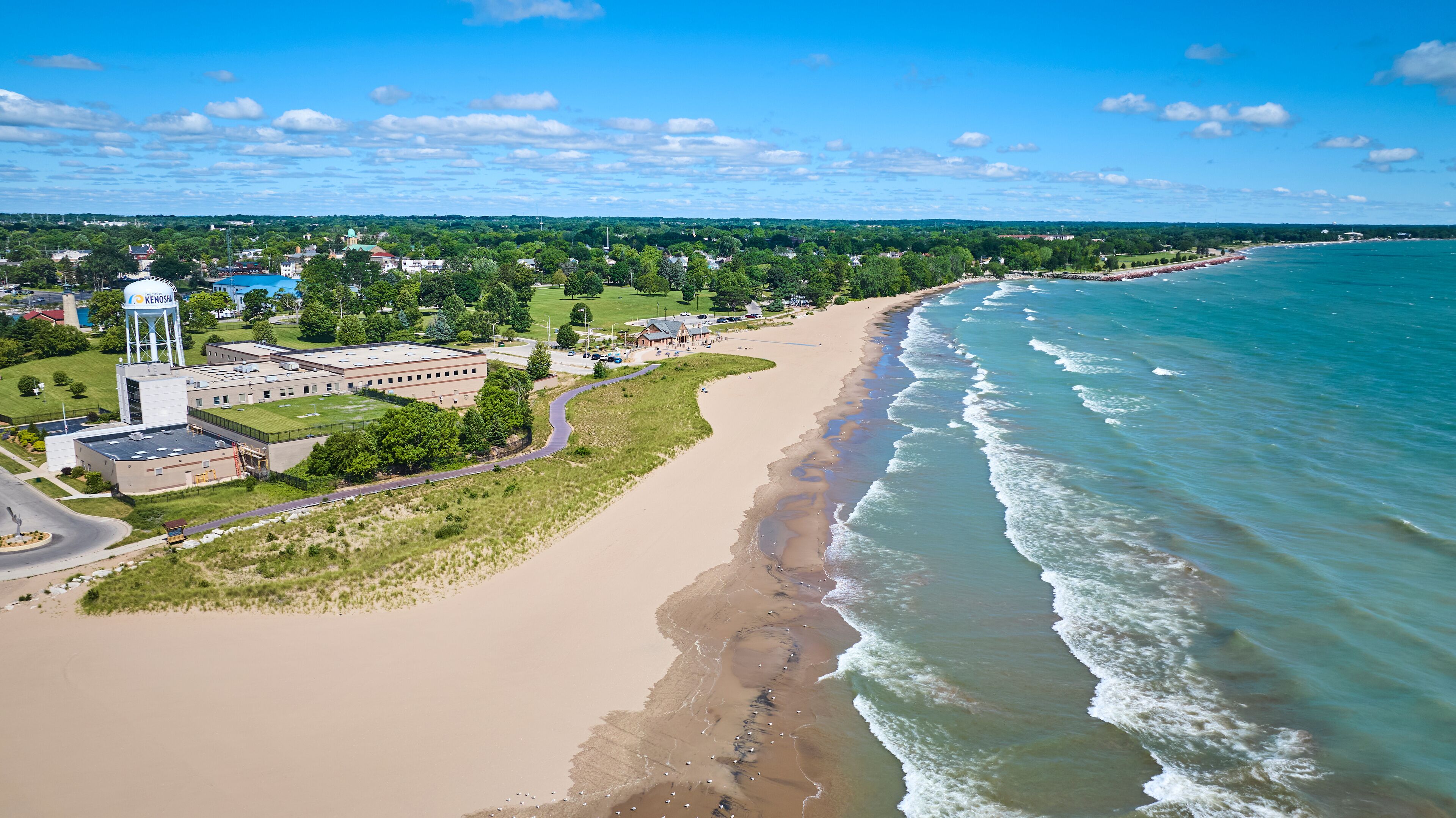 Aerial Fly Over Kenosha Beach and Water Tower