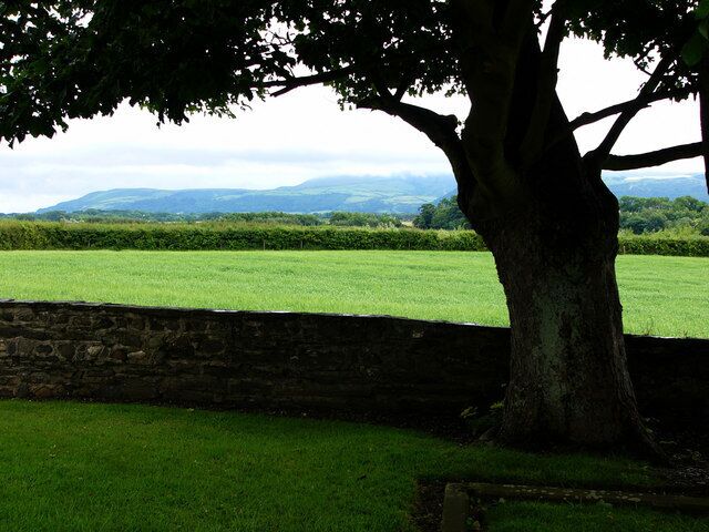 View from Andreas Churchyard Slieau Lewaigue and cloud covered North Barrule in background