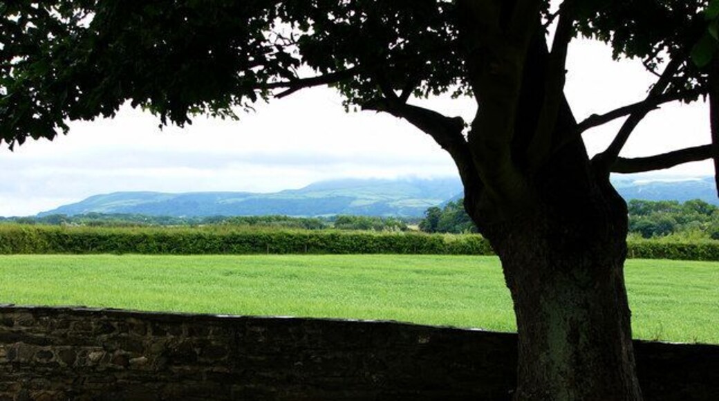 View from Andreas Churchyard Slieau Lewaigue and cloud covered North Barrule in background