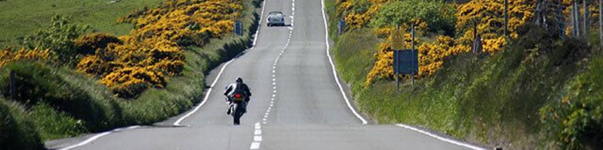Kate's Cottage. Seen along the straight section of the TT course just NW of Creg-ny-Baa.