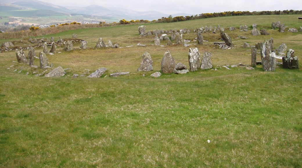 Part of the Manx Heritage Trail, The Braaid is the site of an ancient Celtic-Norse era community. Remnants of a roundhouse in the foreground, c. 650 A.D. and remnants of two longhouses in the background, c. 950 A.D. can be seen here situated on the rolling hills of Marown in central Isle of Man.