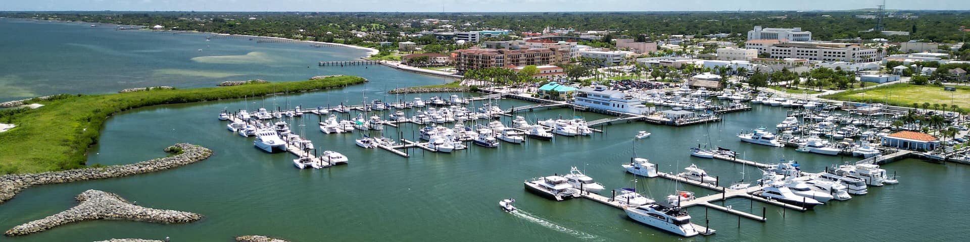 Rock jetties protecting the downtown Fort pierce boat harbor on the Treasure Coast of Florida in St. Lucie County