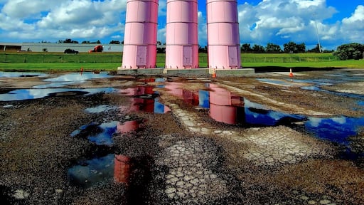 The people at Malley's Chocolates have created themselves quite a roadside attraction with these bright pink silos labeled with the main stars of any good chocolate concoction.