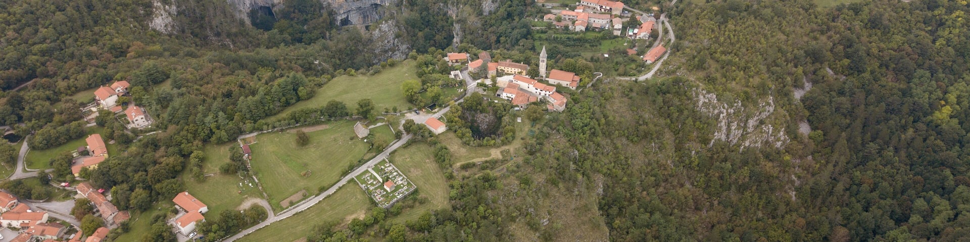 The Skocjan Caves / Skocjanske jame / Grotte di Skocjan is the largest cave in Europe on UNESCO list. The enterance is a huge collapse sinhole / doline below the church of St. Canzian (Kancijan)