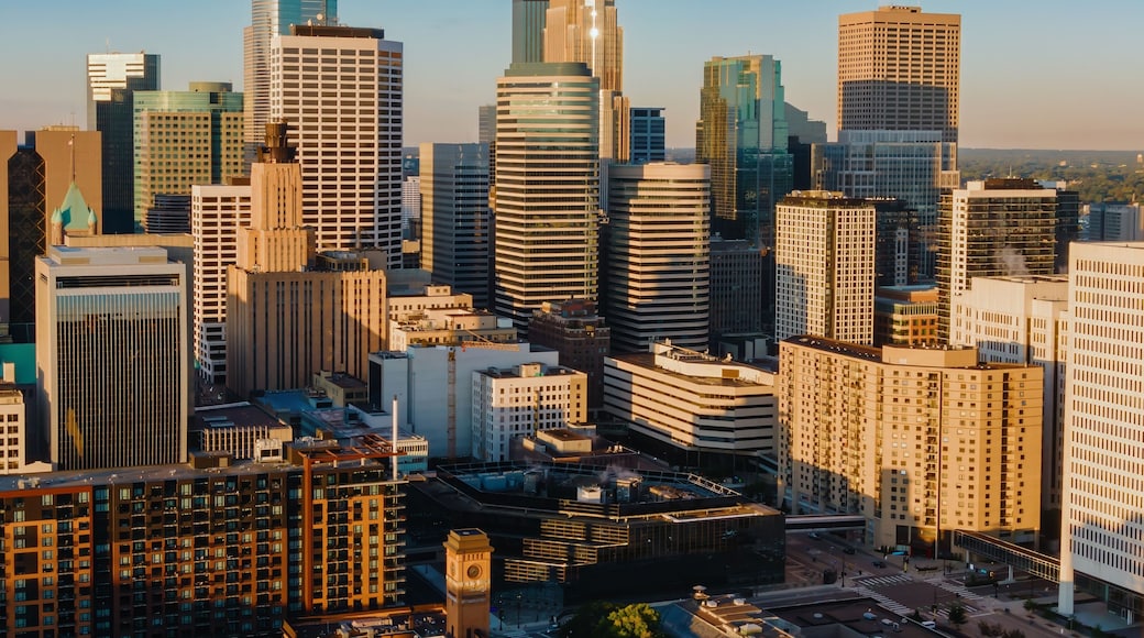 High-angle view of Minneapolis skyline at sunrise. Modern skyscrapers and city streets. Urban landscape. Downtown West, Minneapolis, Minnesota, United States