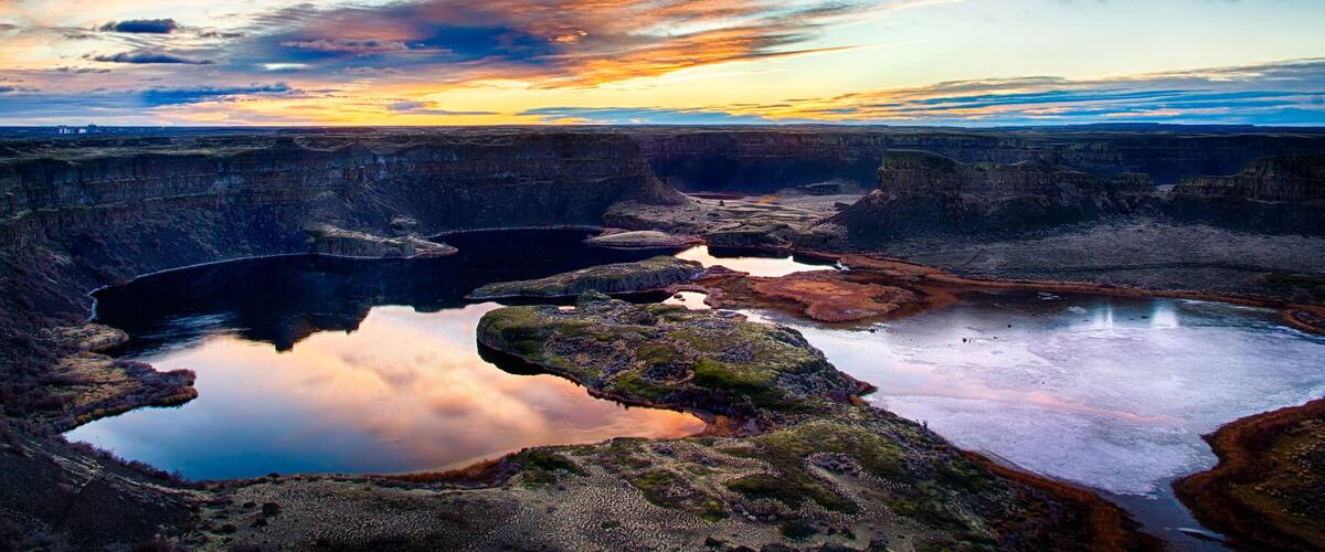 Sunrise over the Grand Coulee and Sun Lakes Dry Falls State Park in Washington State once the world's largest waterfall during the Ice Age floods when glaciers blocked the Columbia River.