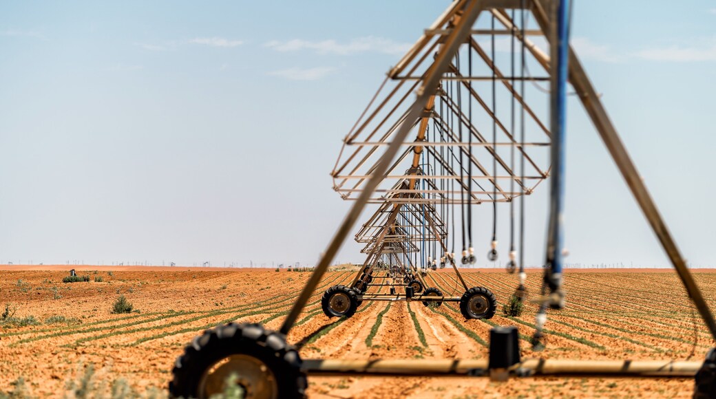 Brownfield, Texas rural countryside industrial field with water or fertilizer chemicals sprayer on dry land