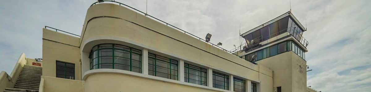 Shoreham Airport is an Art Deco terminal building, a part of a working airport. Recently used as London Airport in the series The Crown. The inside is fully decorated in the Art Deco style