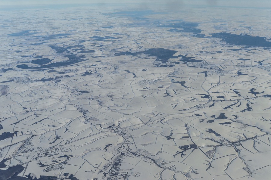 A photo taken while flying from Dubai to Oslo. Having a window seat gives you beautiful views all the time. I always make sure to book a window seat and grab some good pictures. It's way easy as you can follow the airline path using the map on your TV screen and grab some cool pictures.