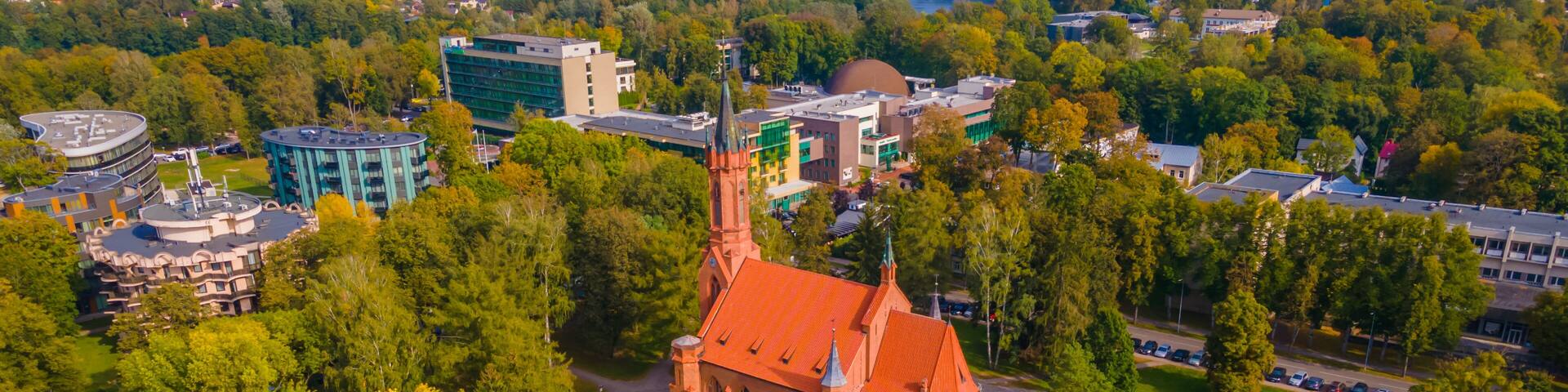 Aerial view of Lithuanian resort Druskininkai church in city park