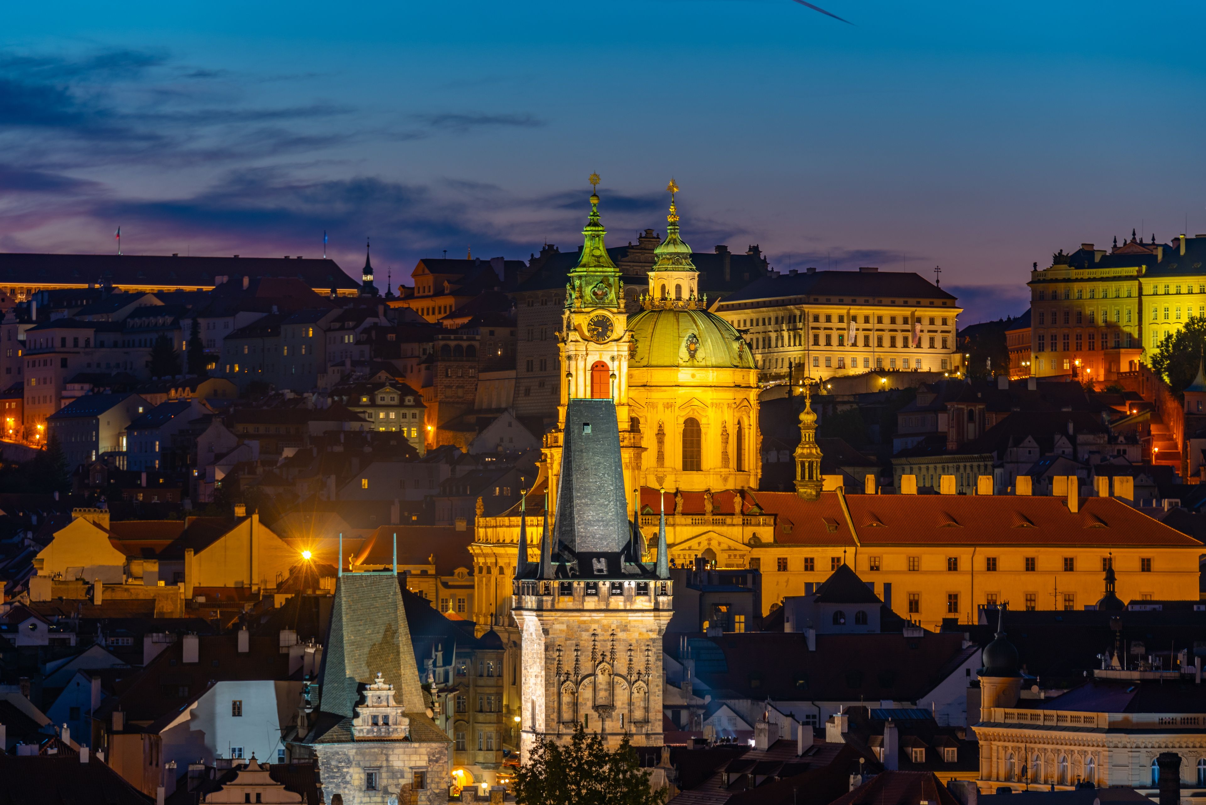 Saint Nicholas church and the charles bridge in Prague, Czech re