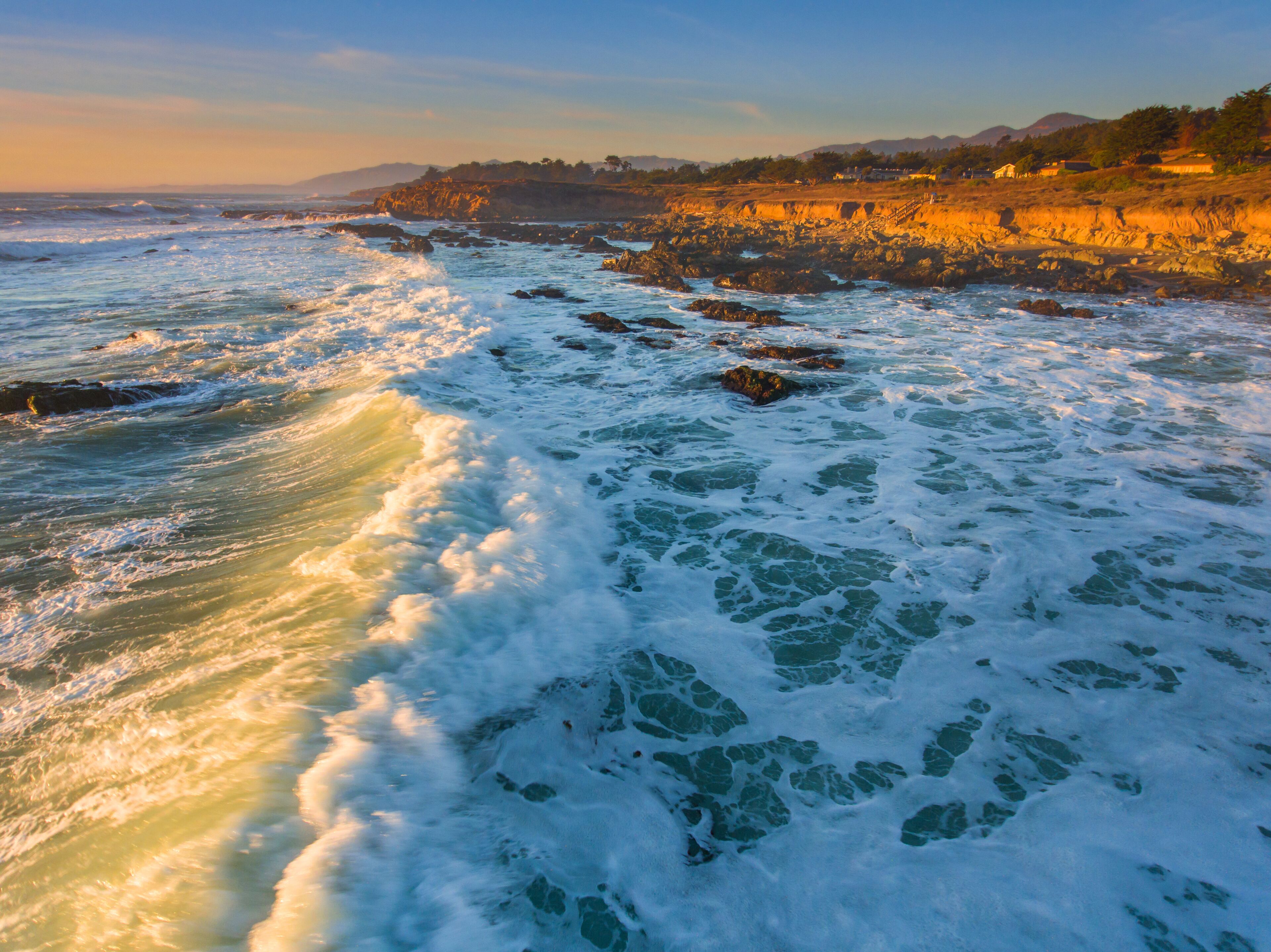 aerial view of surf at Moonstone Beach at sunset, Cambria, California