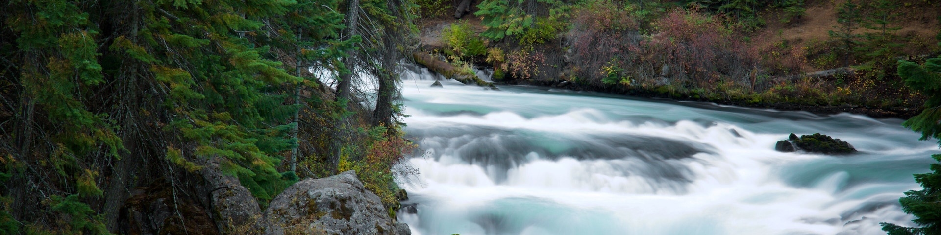 La Pine featuring a river or creek and rapids