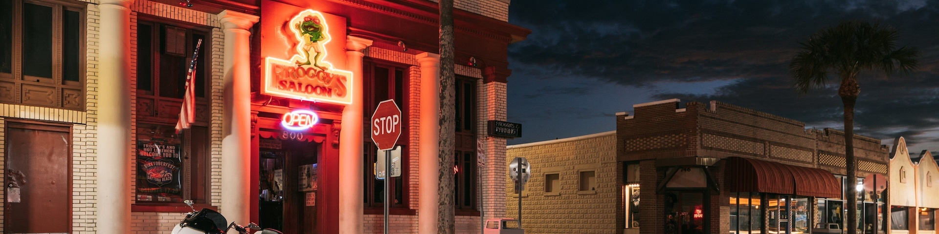 Daytona Beach featuring night scenes and signage