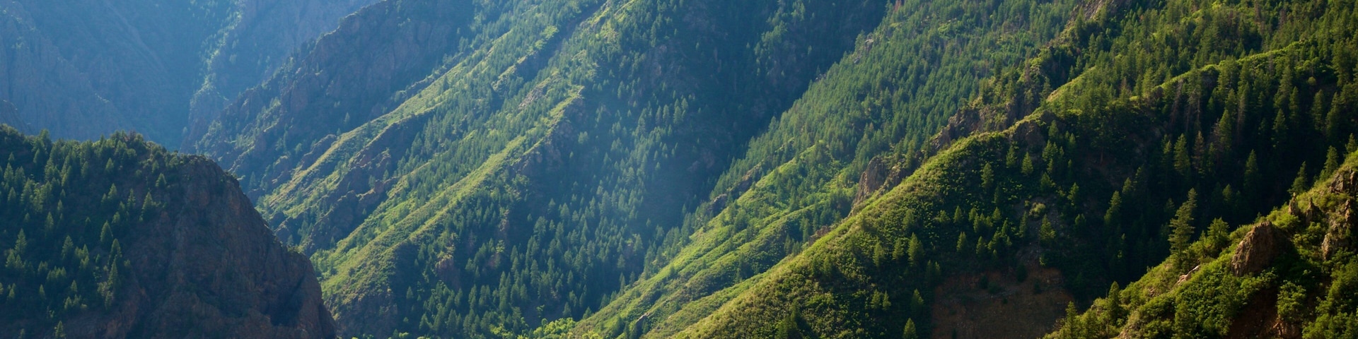 West Elk Loop which includes landscape views, a gorge or canyon and tranquil scenes