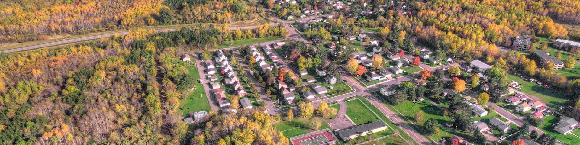 Small Town New Eveleth, Minnesota in Autumn seen by Drone