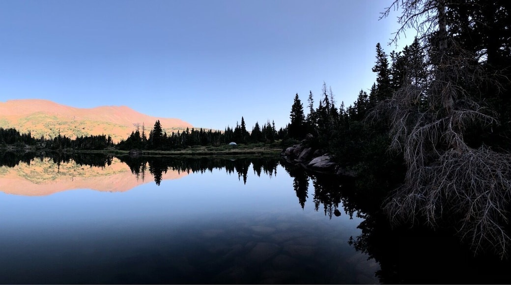 This small unarmed lake between Lower Red Castle Lake and Red Castle Lake is where you want to be on a calm sunrise in August. A ten mile hike or backpack from China Meadows Trailhead. #AboveItAll #sunrise #lake #backpacking #uintas #wilderness