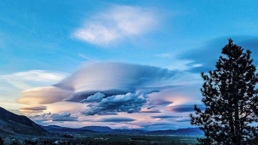I watched the clouds roll around the side of the mountain. They looked like a scene from a movie and I well expected UFOs to come popping out.
Sunset, March 28th 2016
From the Eastern Sierras on the Nevada side  #blue