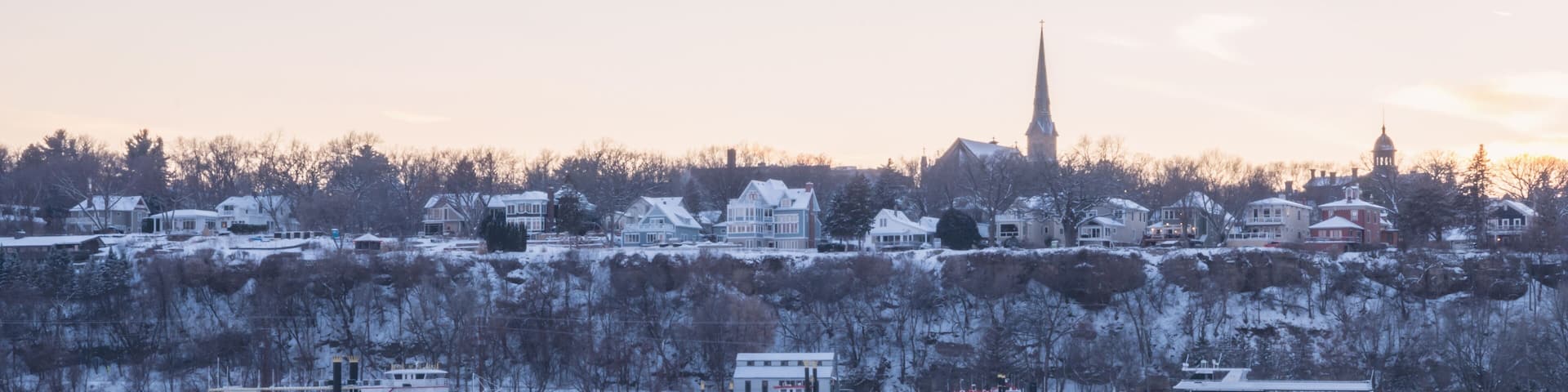 City of Stillwater Minnesota under sunset, including St. Michael's Catholic Church