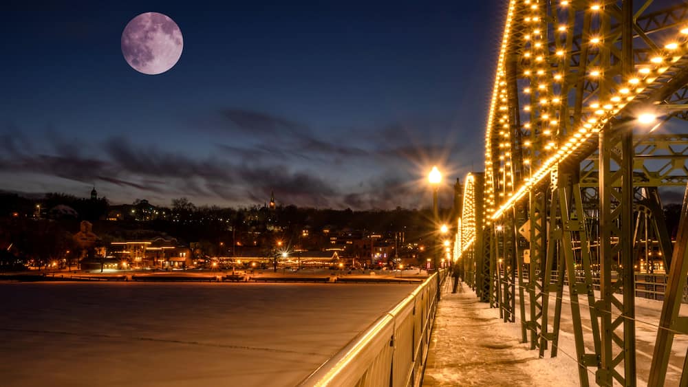 Night view of Stillwater from lift bridge under the Moon