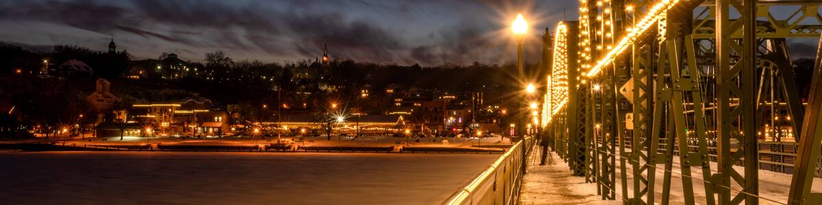Night view of Stillwater from lift bridge under the Moon