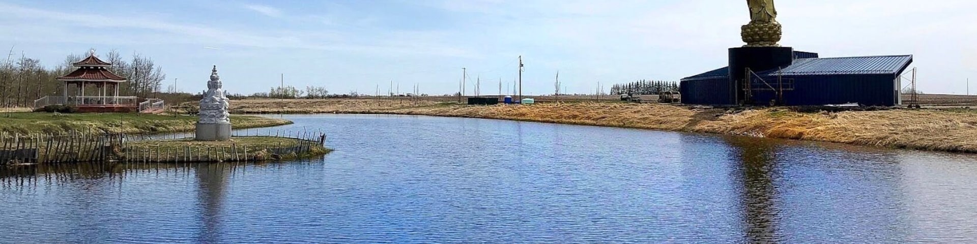 The bronze Amitaba Buddha on the right — “Infinite Light” in Sanskrit — stands 11.6 metres (38 feet) upon a giant lotus flower three metres tall. The Westlock Meditation Centre is located in Busby, Alberta, about one hour away from Edmonton. (2019)