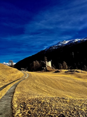 A walk from splugen in Switzerland to the nearby village of sufers. A beautiful walk in the winter sun