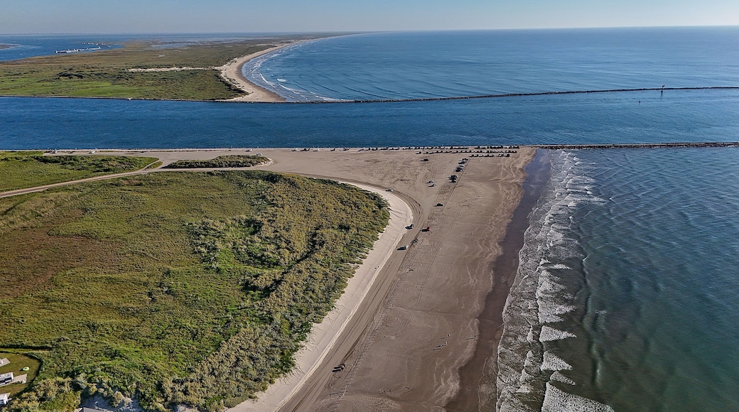 The waves large and small continue to lap on shore of the beaches along the Gulf of Mexico in Port Aransas. Beach goers enjoy the sun, surf, birds, sea shells, sea turtles, and fishing.