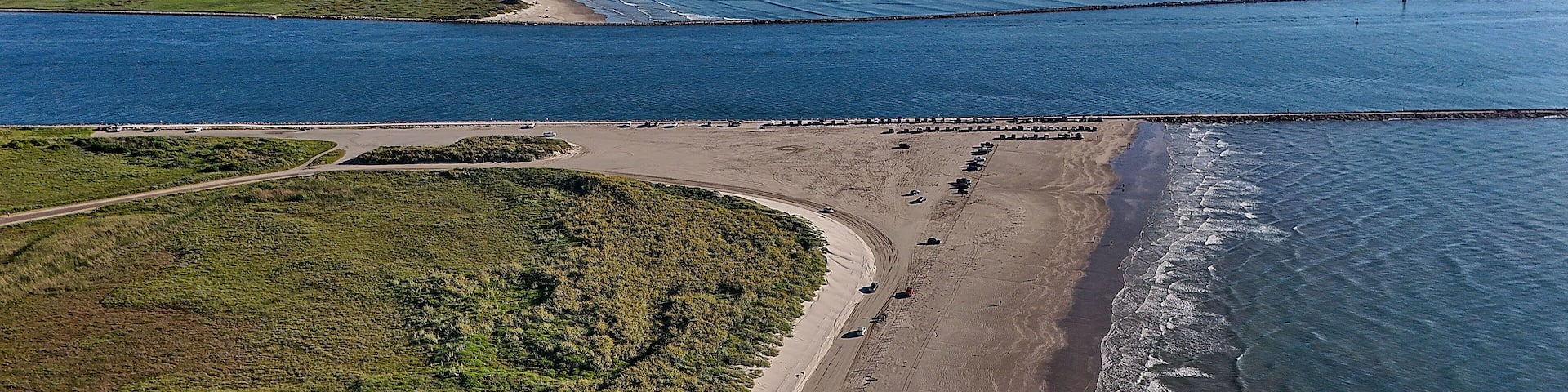 The waves large and small continue to lap on shore of the beaches along the Gulf of Mexico in Port Aransas. Beach goers enjoy the sun, surf, birds, sea shells, sea turtles, and fishing.