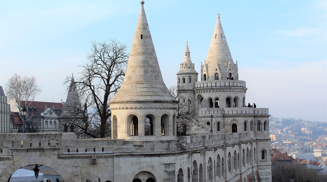 Fisherman's Bastion is a terrace in neo-Gothic and neo-Romanesque style situated on the Buda bank of the Danube, on the Castle hill in Budapest, around Matthias Church. It's seven towers represent the seven Magyar tribes that settled in the Carpathian Basin in 895. It was designed and built between 1895 and 1902 on the plans of Frigyes Schulek. Between 1947–48, the son of Frigyes Schulek, János Schulek, conducted the other restoration project after its near destruction during World War II.
My favorite place in Budapest! I took this photo in March 2018. And it's merely one part of the Fisherman's Bastion.
