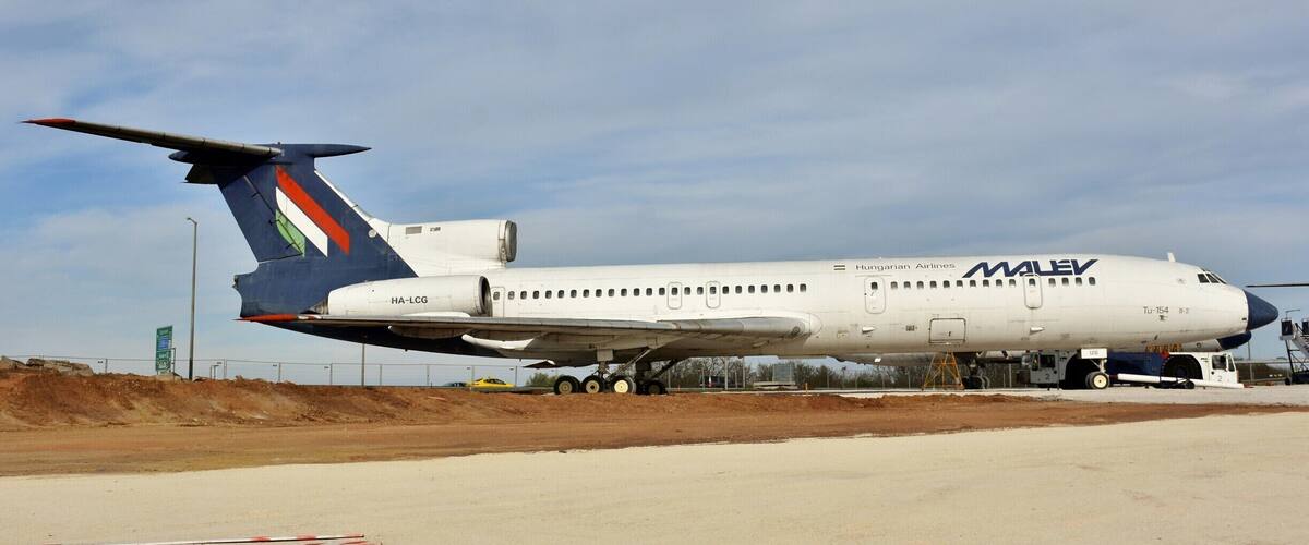 A Hungarian Airlines Tu-154 aircraft on a runway.