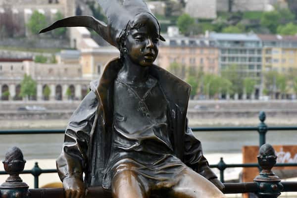 Sitting casually on the railings next to a tram stop along the Danube, this statue of a young princess was designed by sculptor Lászlo Marton.