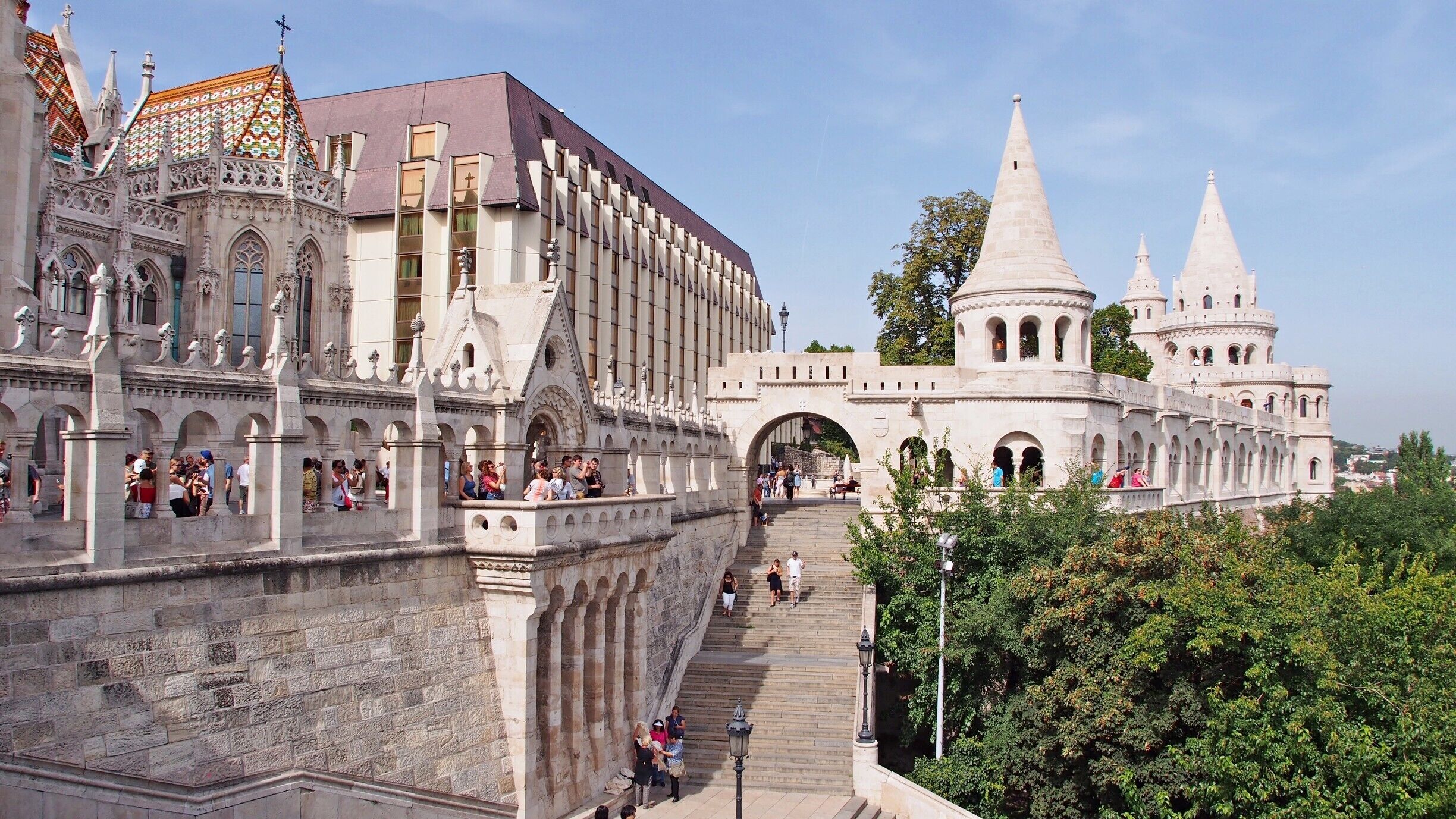 Fisherman's bastion is a viewing terrace on Buda castle hill with great views over Danube. The terrace appears older than it is, as it has only been built in early 1900s. The area is popular with tourists, so the cafes and vendors are a bit overpriced. Come for the view, and enjoy a moment of feeling like a Disney-princess (or a prince).