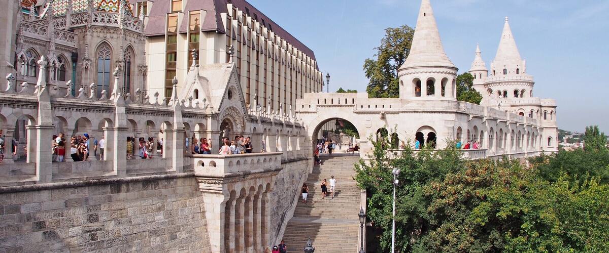 Fisherman's bastion is a viewing terrace on Buda castle hill with great views over Danube. The terrace appears older than it is, as it has only been built in early 1900s. The area is popular with tourists, so the cafes and vendors are a bit overpriced. Come for the view, and enjoy a moment of feeling like a Disney-princess (or a prince).