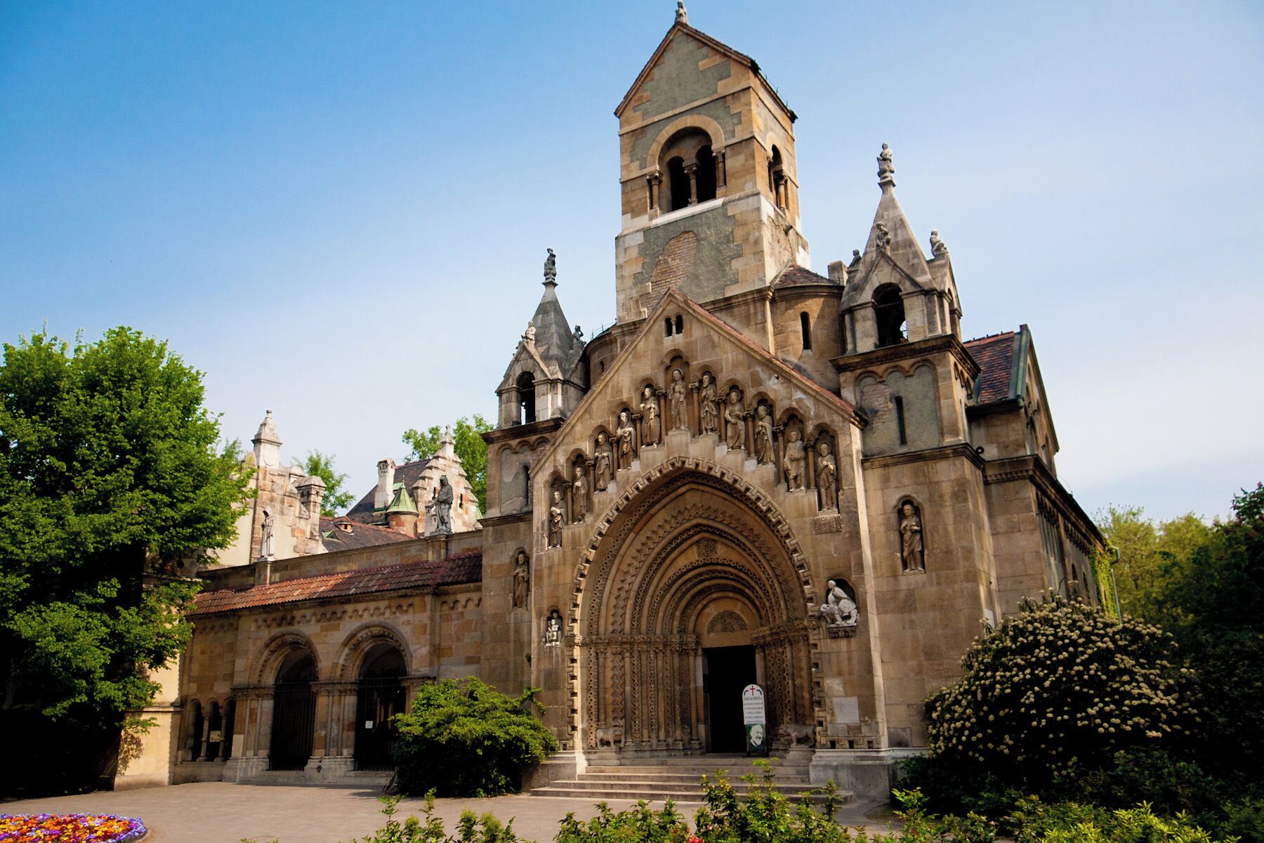 Vajdahunyad Castle is an exhibition castle in the City Park in Budapest. It was built between 1896 and 1908 as part of the Millennial Exhibition which celebrated 1000 of the Hungarian Empire. The castle blends a number of different architectural styles including Romanesque, Gothic, Renaissance, and Baroque.

The oldest part of the castle is the Romanesque style which reflects the architecture of the 11th - 13th centuries. The replica of the Portal of the Church of Jak (pictured here) was chosen as a representation the Romanesque style found in western Hungary. The entire Church of Jak could not be copied due to its size, so just the elaborate church gate was recreated.