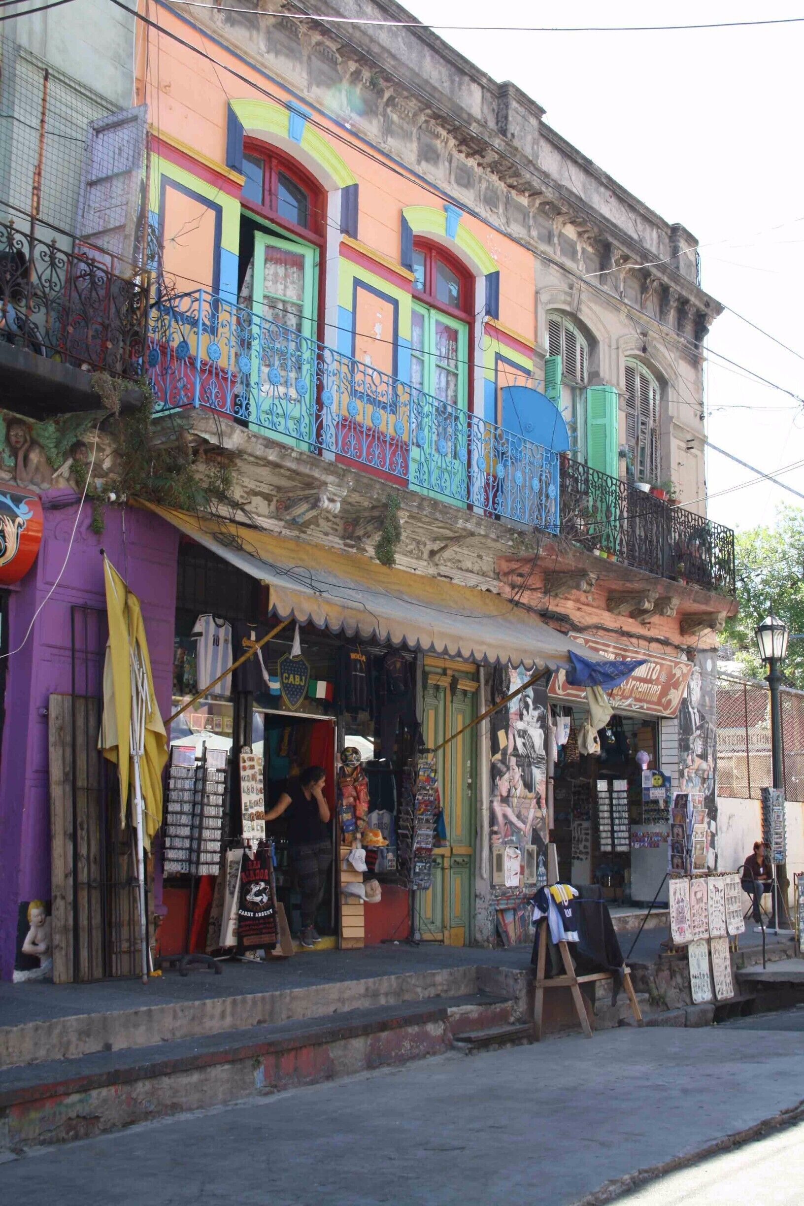 La Boca being so colorful (and very very touristy) with its streetartists dancing the tango everywhere, bright colonial houses, streetart and graffiti (every wall a is canvas waiting to be drawed upon), and ofcourse home to the local and most popular soccerclub; Bocas Juniors.

Read more: http://mokumsurfclub.com/fluent-tango-buenos-aires/