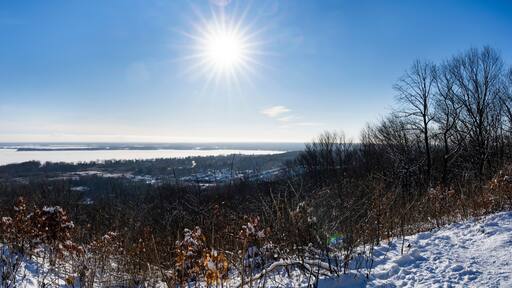 Panoramic view of Lac des Deux Montagnes during a beautiful winter sunny day in Quebec, Canada
