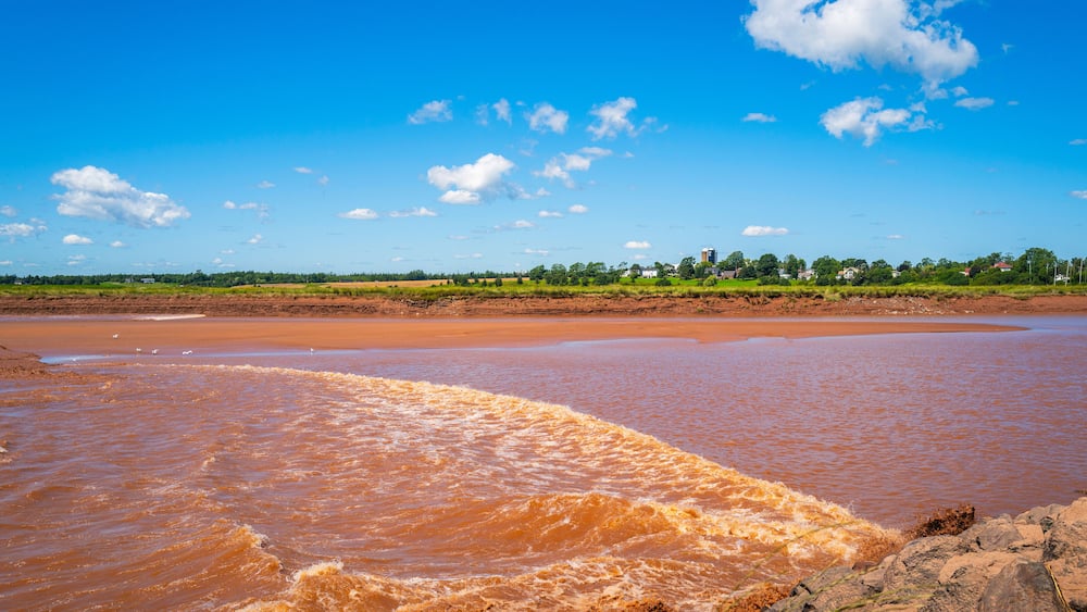 Tidal Bore at Fundy Discovery Site in Truro with oceanside tides traveling upstream on the Salmon River in Nova Scotia, Canada
