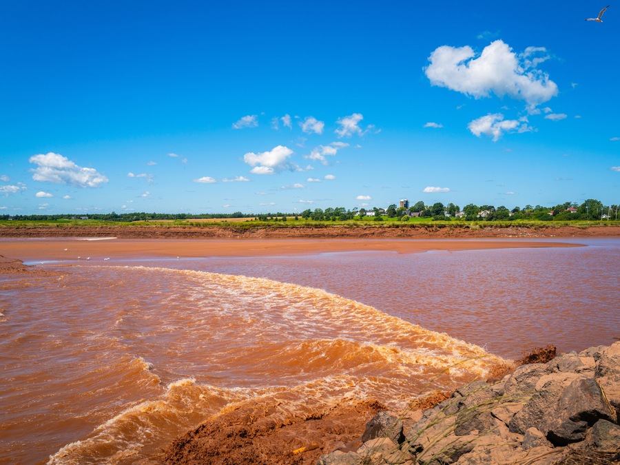 Tidal Bore at Fundy Discovery Site in Truro with oceanside tides traveling upstream on the Salmon River in Nova Scotia, Canada