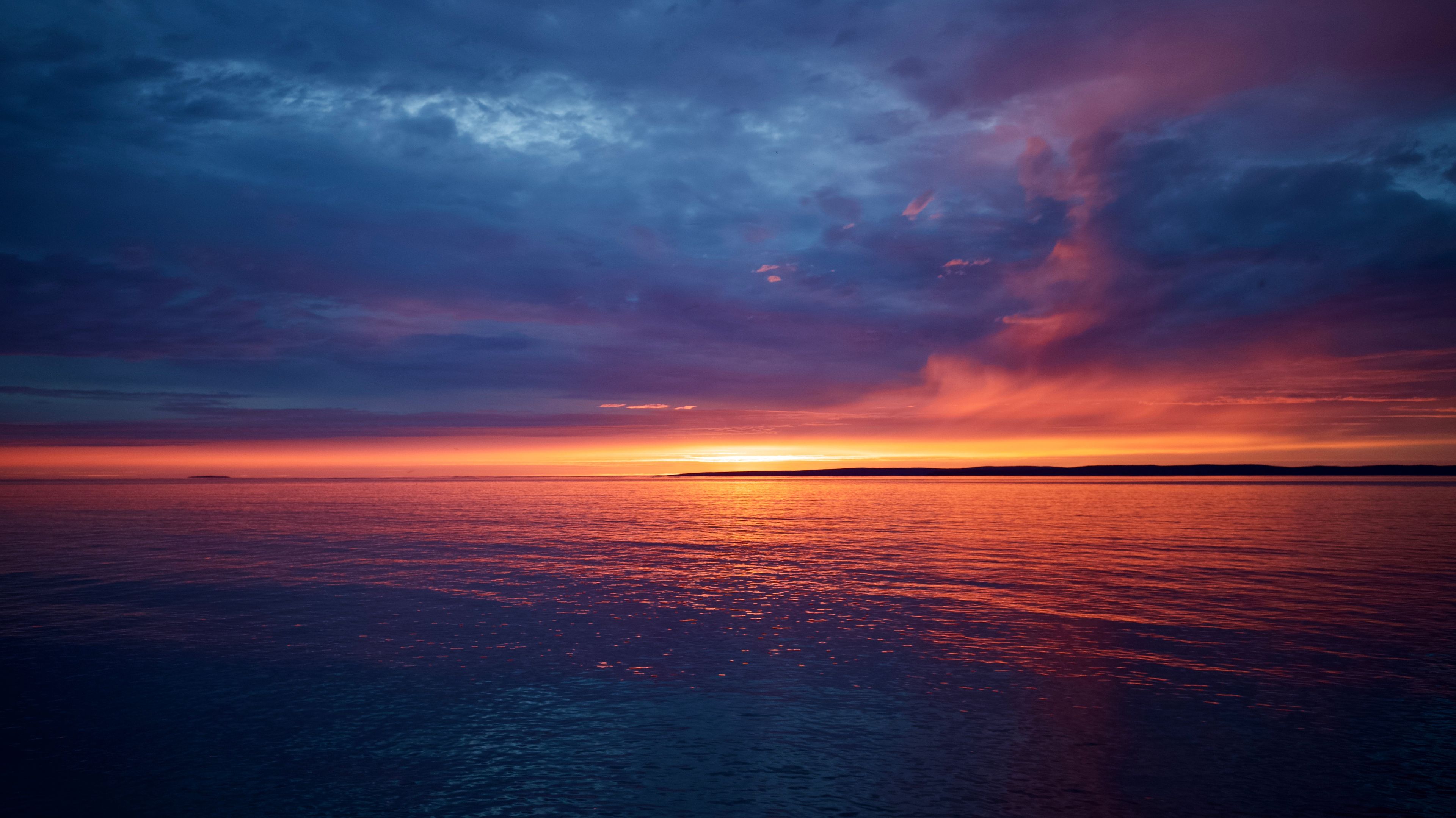 sunset over the ocean in halls harbour