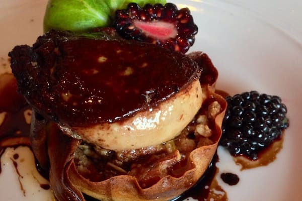 Beautiful restaurant in downtown Buffalo. This is fois gras on a dark berry tart. Melts in your mouth.