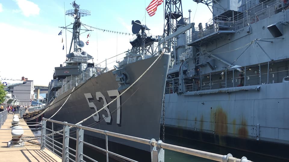 Marina with couple planes, Submarines, Attack boats, and other military ships. Can also get a tour of some of the ships for a price. Great for a walk on a hot day as you feel a breeze from the water. Also a large field along marina filled with wooden lawn chairs to relax in and enjoy.