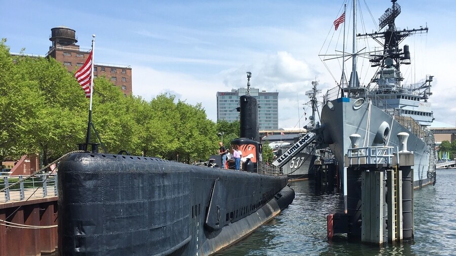 Marina with couple planes, Submarines, Attack boats, and other military ships. Can also get a tour of some of the ships for a price. Great for a walk on a hot day as you feel a breeze from the water. Also a large field along marina filled with wooden lawn chairs to relax in and enjoy.