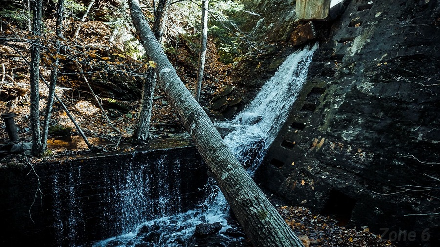 Walked about 200 feet into the trail until you come to the intersection, walk left about 1 km and then descend 300 ft down the cliff edge to get here. The cliff is extremely challenging to navigate.