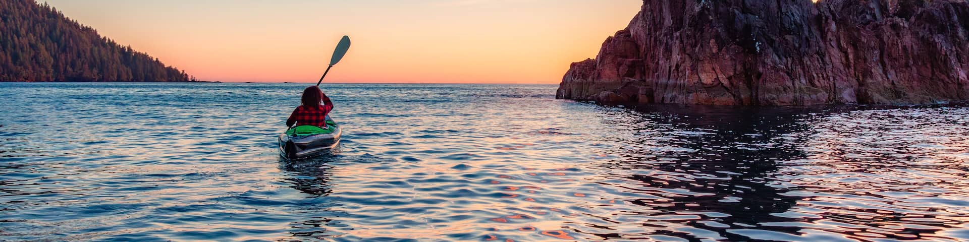 Kayaking in Canadian Nature Landscape on the West Coast of Pacific Ocean.