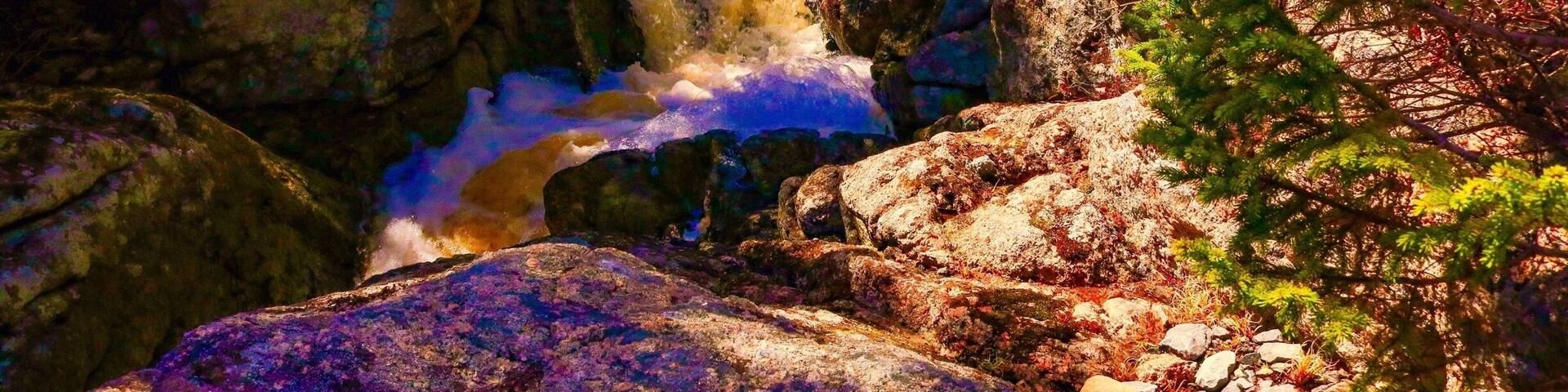 This waterfall runs through 2 private properties. Drive on Herring Cove Road until you get to Ashley Drive. Park outside of the gate and follow the stream down to the falls.